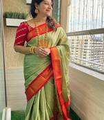 Green ethnic motifs woven design zari kanjeevaram saree