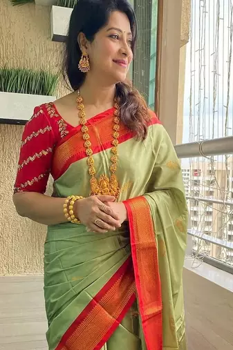 Green ethnic motifs woven design zari kanjeevaram saree