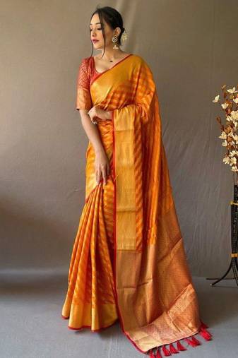 Yellow woven design zari patola saree