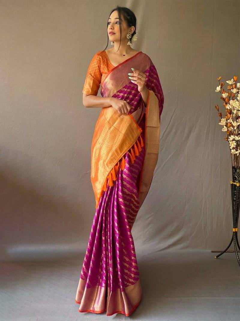 Purple ethnic motifs woven design zari patola saree
