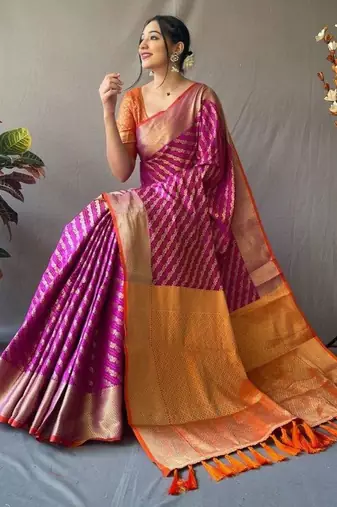 Purple ethnic motifs woven design zari patola saree
