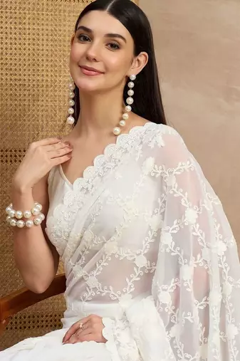 White floral embroidered  georgette heavy work saree