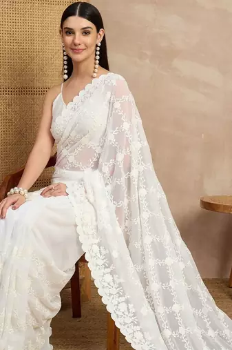 White floral embroidered  georgette heavy work saree