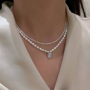 White fancy two necklace set pearl crystal studded festive casual 1