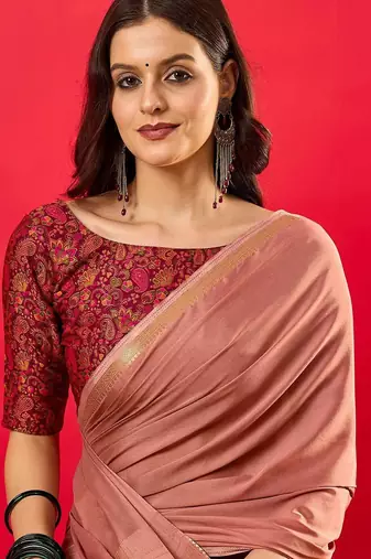 Peach solid mysore silk saree with woven design zari border