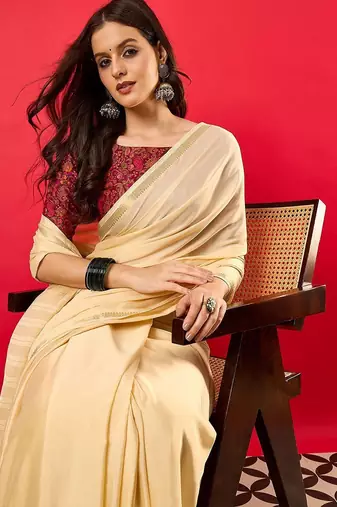 Peach solid mysore silk saree with woven design zari border