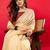 Peach solid mysore silk saree with woven design zari border