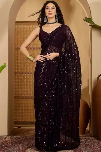 Purple sequinned heavy work saree