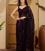 Purple sequinned heavy work saree