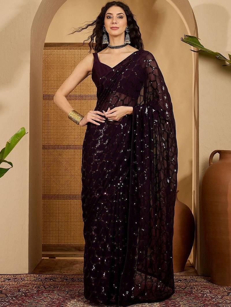 Purple sequinned heavy work saree
