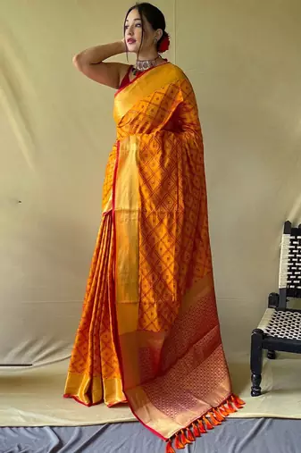 Yellow woven design zari patola saree