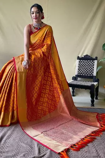 Yellow woven design zari patola saree