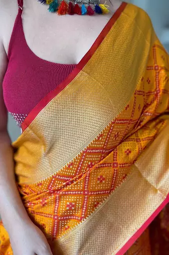 Yellow woven design zari patola saree
