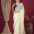 Cream embroidered beads and stones saree