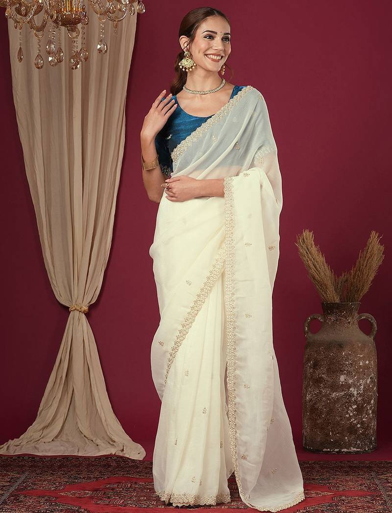 Cream embroidered beads and stones saree