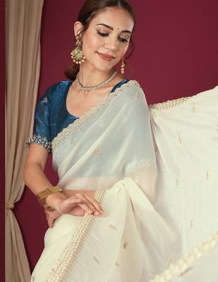 Cream embroidered beads and stones saree 5