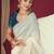 Cream embroidered beads and stones saree