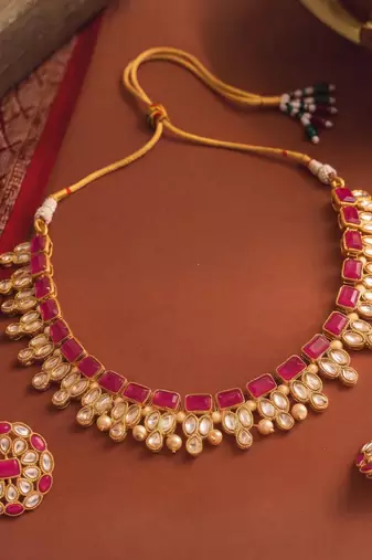 Pink faux ruby crystals studded necklace earrings set for women