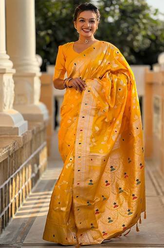 Yellow woven design zari saree