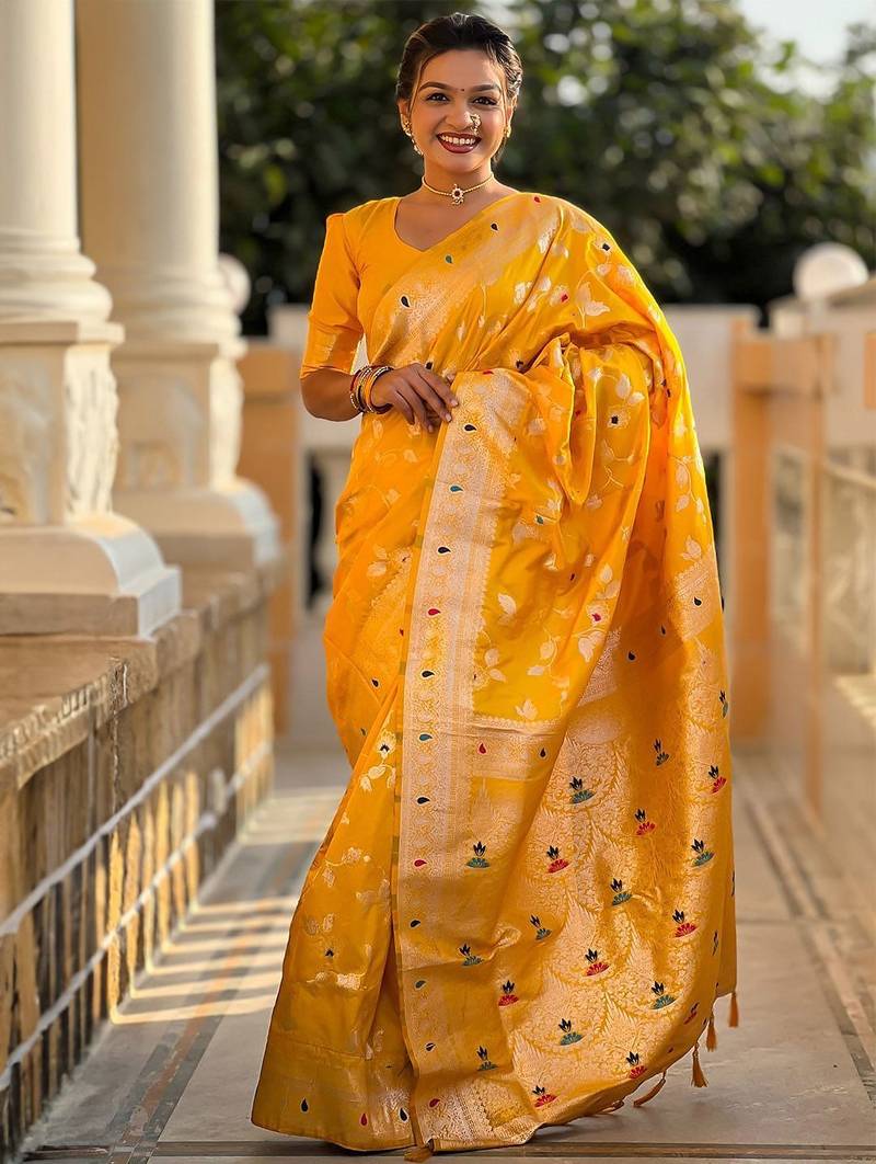 Yellow woven design zari saree