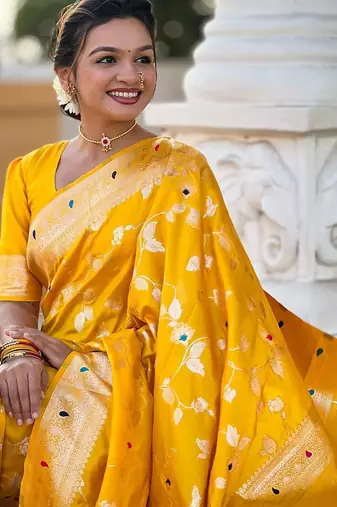 Yellow woven design zari saree