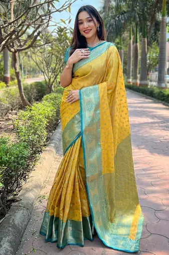 Yellow ethnic motifs woven design zari kanjeevaram saree