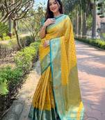 Yellow ethnic motifs woven design zari kanjeevaram saree