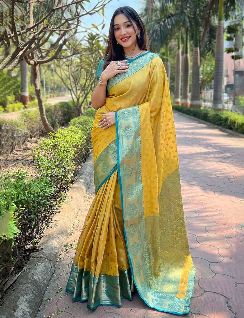 Yellow ethnic motifs woven design zari kanjeevaram saree