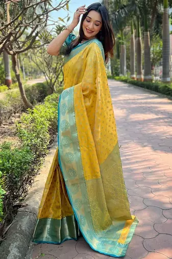 Yellow ethnic motifs woven design zari kanjeevaram saree