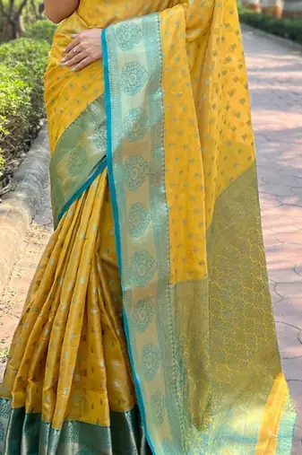 Yellow ethnic motifs woven design zari kanjeevaram saree