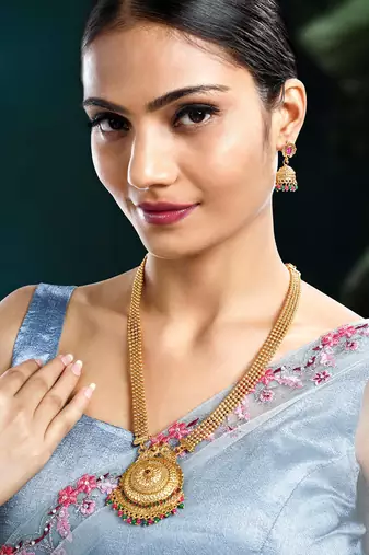 Women's gold toned rani pink & green synthetic stone studded long maharani