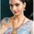 Women's gold toned rani pink & green synthetic stone studded long maharani