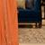 Orange woven design embroidered poly georgette leheriya saree