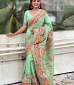 Green woven design silk blend saree