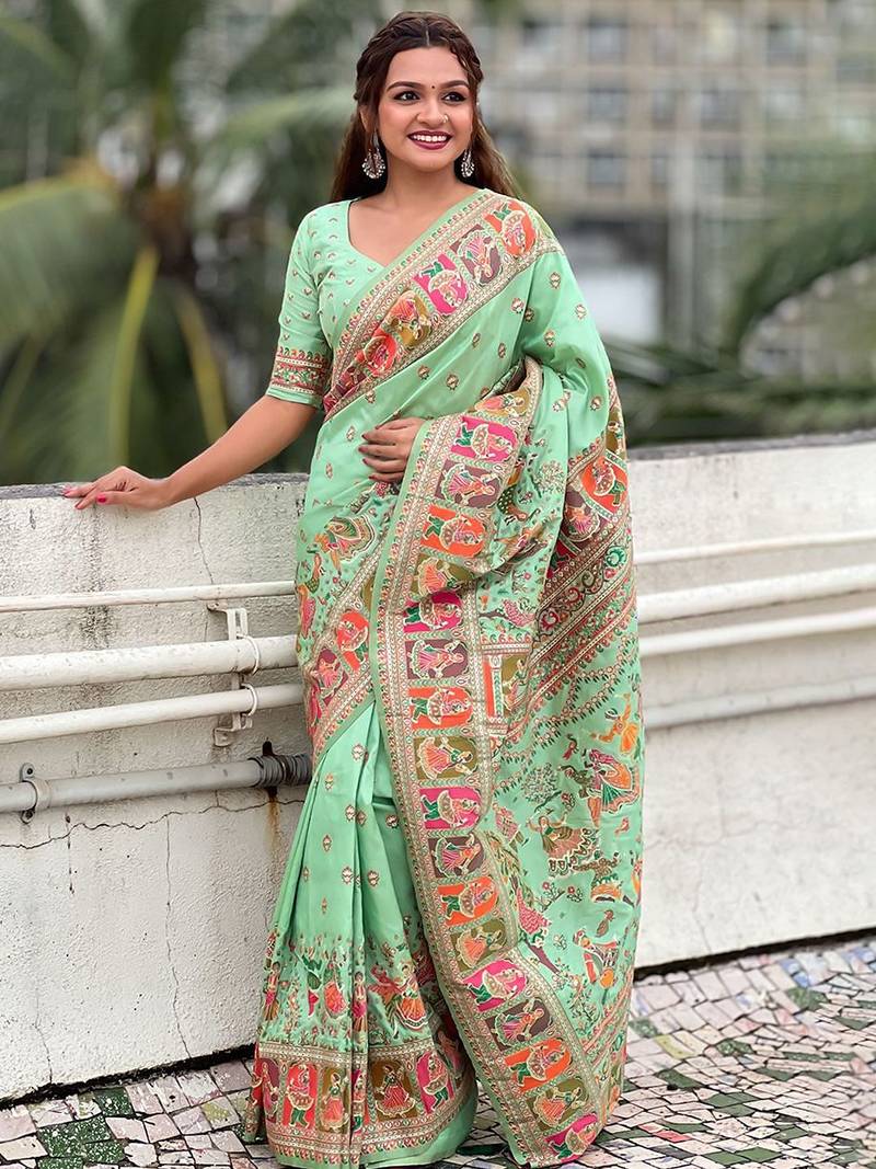 Green woven design silk blend saree