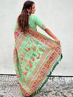 Green woven design silk blend saree 3