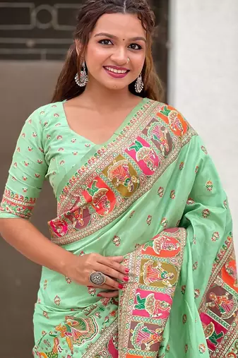 Green woven design silk blend saree