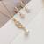 Gold plated american diamond & pearl studded pendant necklace chain