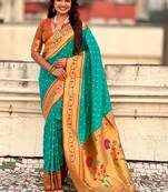 Turquoise woven design zari silk blend handloom paithani saree