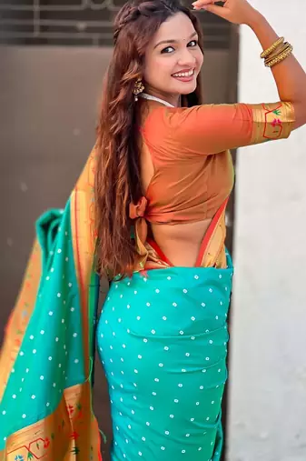 Turquoise woven design zari silk blend handloom paithani saree