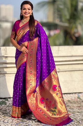 Purple ethnic motifs woven design zari paithani saree