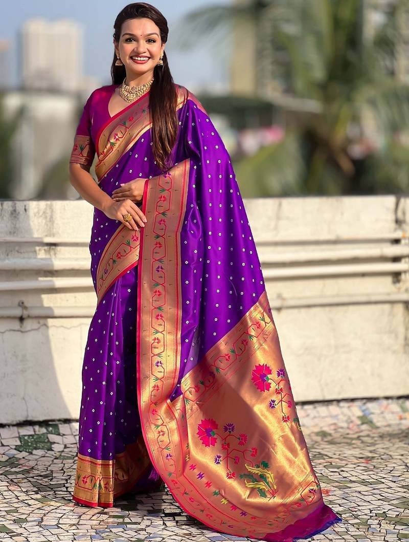 Purple ethnic motifs woven design zari paithani saree