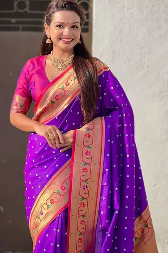 Purple ethnic motifs woven design zari paithani saree
