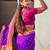 Purple ethnic motifs woven design zari paithani saree