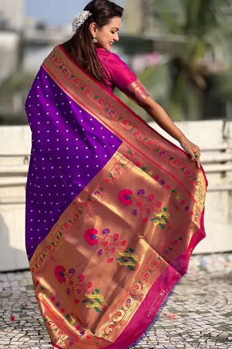 Purple ethnic motifs woven design zari paithani saree
