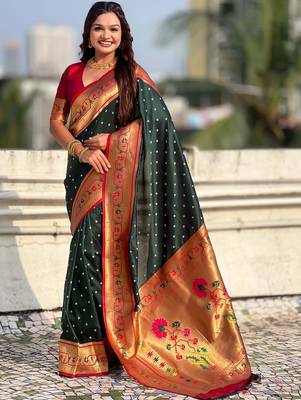Green woven design zari silk blend handloom paithani saree 1