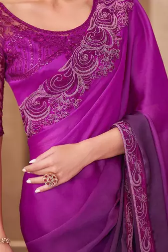 Magenta sequinned saree with unstitched blouse