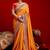 Orange embellished zari silk blend heavy work saree