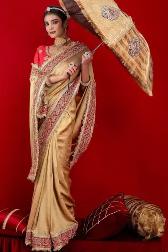 Gold embellished embroidered silk blend heavy work saree