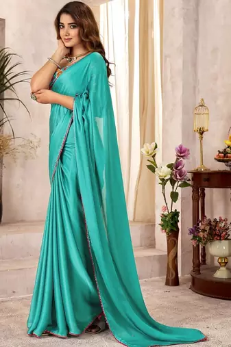 Turquoise kutchi embroidery satin designer saree